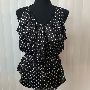 Milano sleeveless peplum blouse.